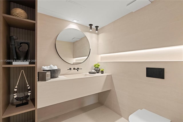 bathroom with vanity and toilet