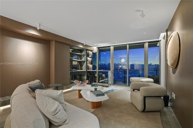 living area with expansive windows and a city view