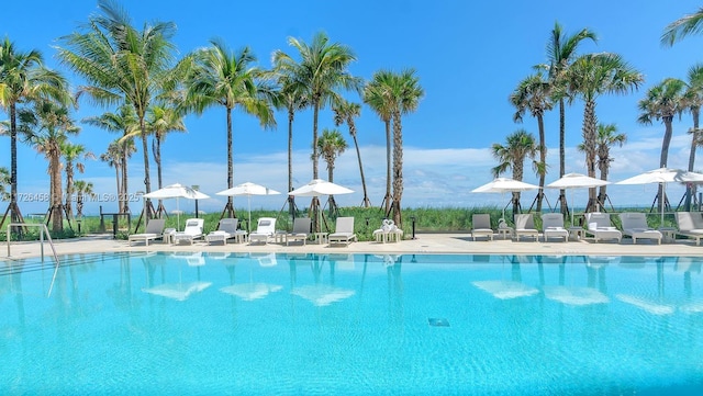 pool with a patio area