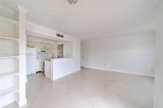 unfurnished living room featuring crown molding and light tile patterned flooring