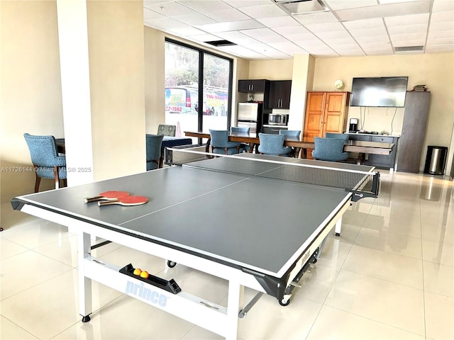 1621 Collins Ave Unit 310, Miami Beach, FL 33139 - game room with visible vents, a drop ceiling, and light tile patterned floors
