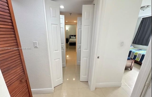 1621 Collins Ave Unit 310, Miami Beach, FL 33139 - hall featuring recessed lighting, baseboards, and light tile patterned floors