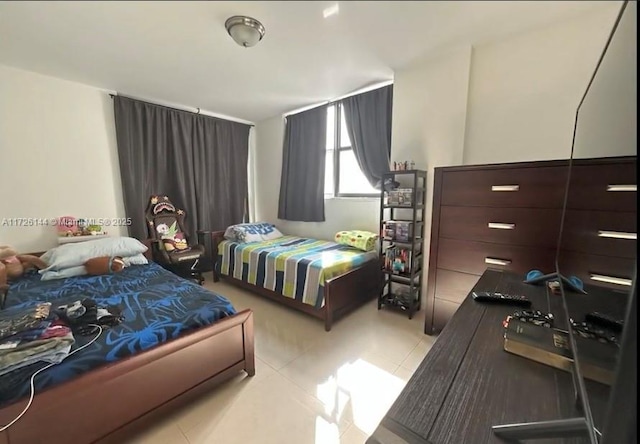 1621 Collins Ave Unit 310, Miami Beach, FL 33139 - bedroom featuring tile patterned flooring