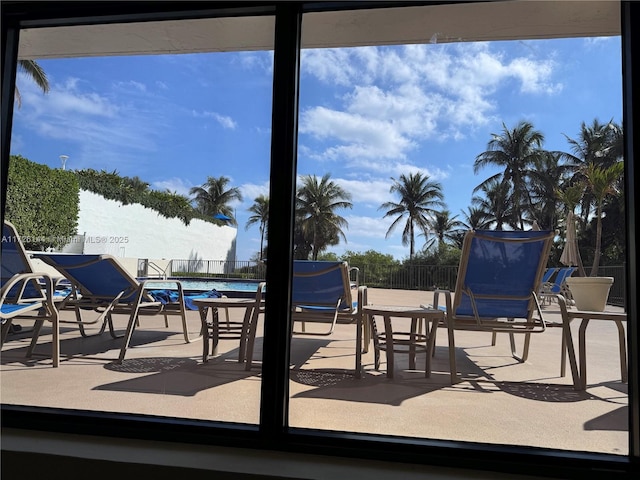 1621 Collins Ave Unit 310, Miami Beach, FL 33139 - view of patio / terrace with fence and a community pool