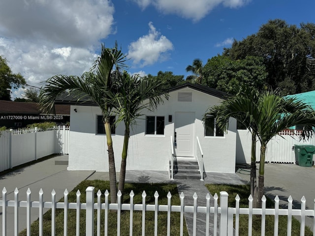 view of side of home featuring a patio