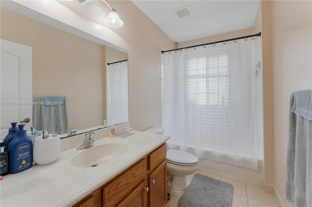 full bathroom with toilet, tile patterned floors, vanity, and shower / tub combo