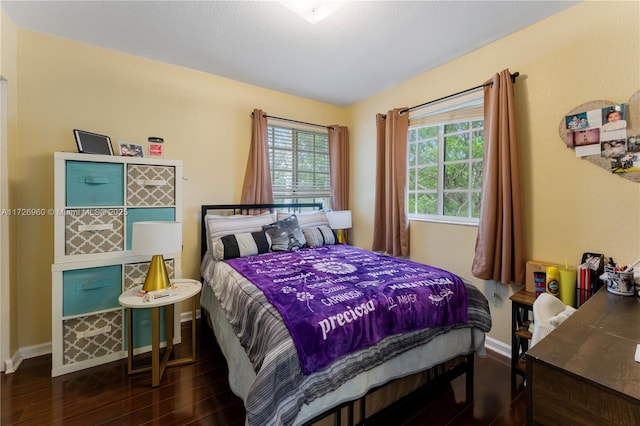 bedroom featuring dark hardwood / wood-style floors