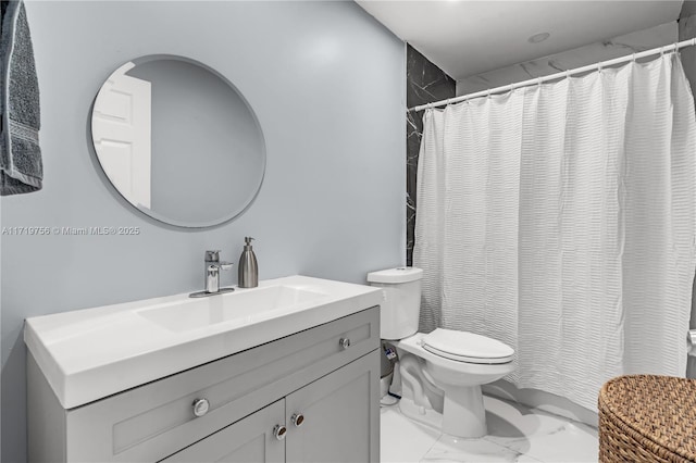 bathroom with toilet, vanity, and curtained shower