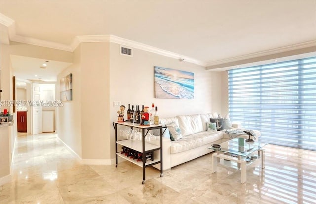 living room with a wall of windows and ornamental molding