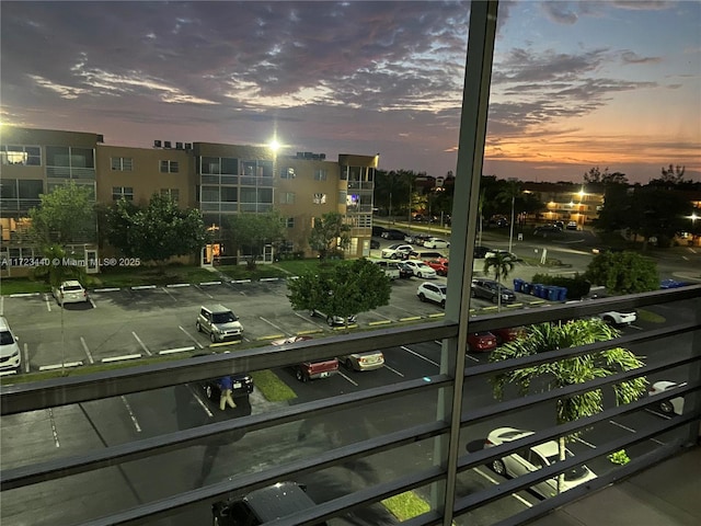 view of balcony at dusk