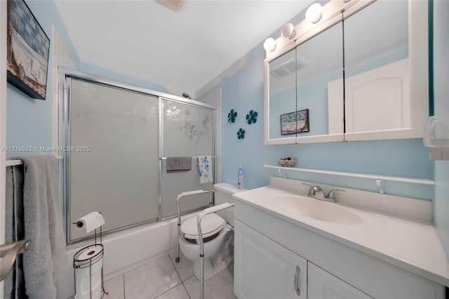 full bathroom with toilet, bath / shower combo with glass door, tile patterned floors, and vanity