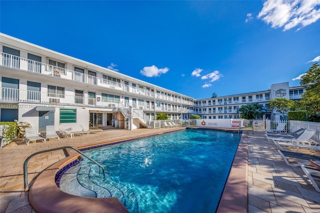 view of swimming pool featuring a patio