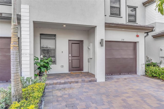 entrance to property featuring a garage