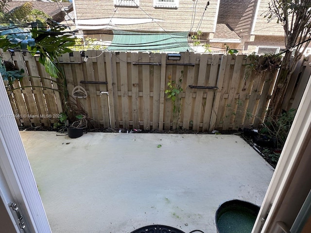 view of patio with fence