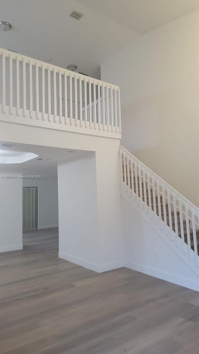 571 SE 37th Pl, Homestead, FL 33033 - stairway featuring wood-type flooring
