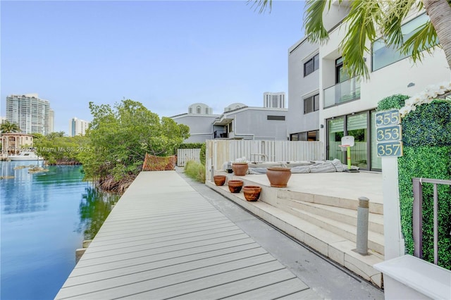 dock area featuring a water view