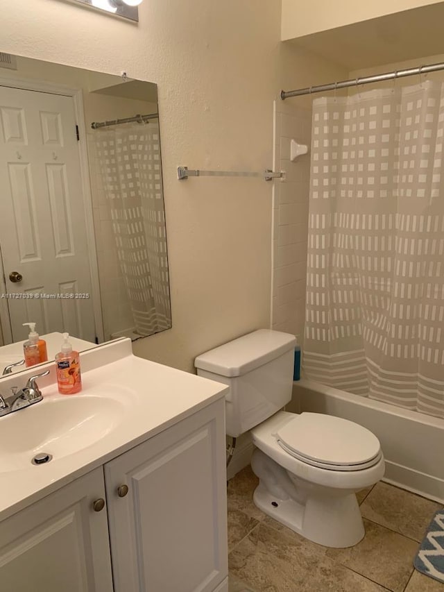 full bathroom with toilet, vanity, and shower / bath combination with curtain