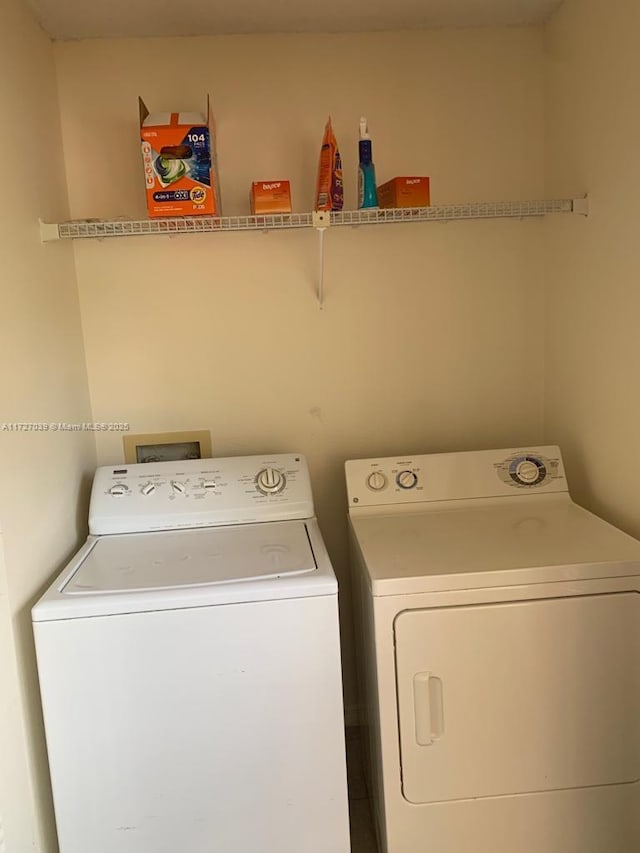 laundry area featuring washer and clothes dryer