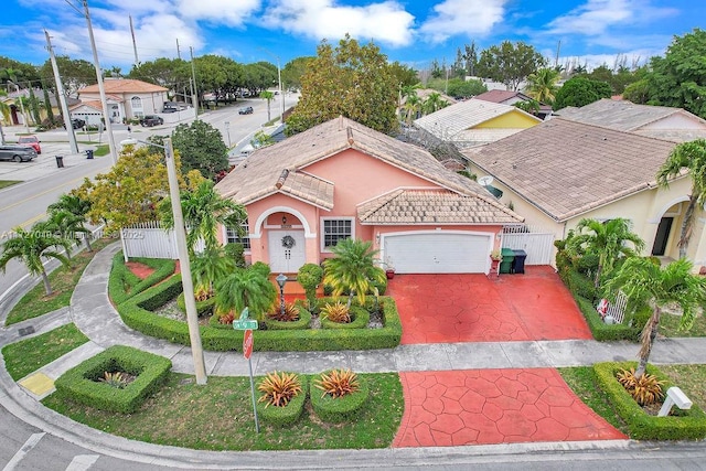 mediterranean / spanish-style house featuring a garage