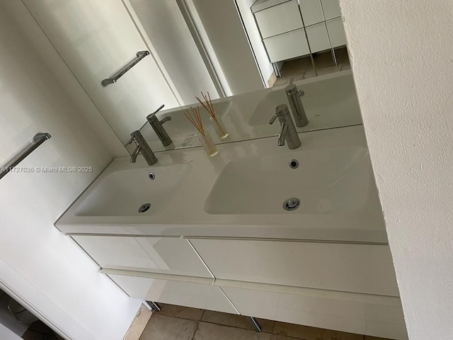 bathroom with tile patterned floors