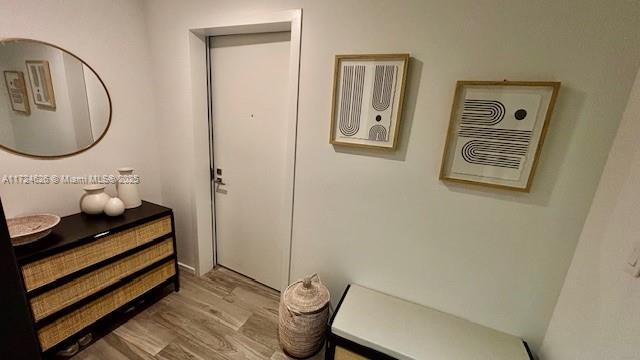 801 S Miami Ave Unit 4706, Miami, FL 33130 - corridor featuring light wood-style flooring