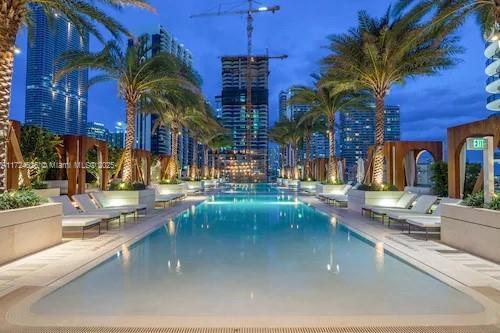 801 S Miami Ave Unit 4706, Miami, FL 33130 - pool at twilight with a community pool