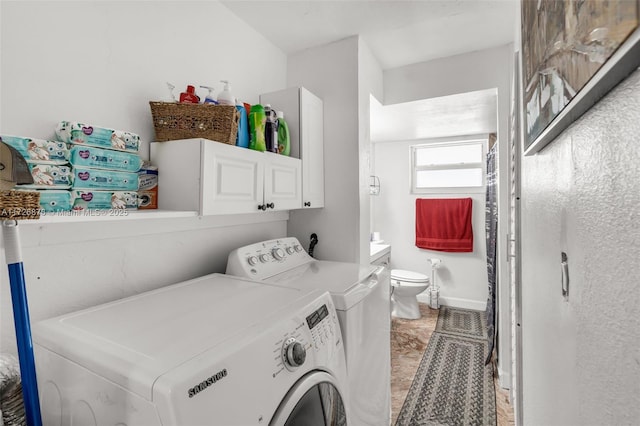 laundry room with separate washer and dryer