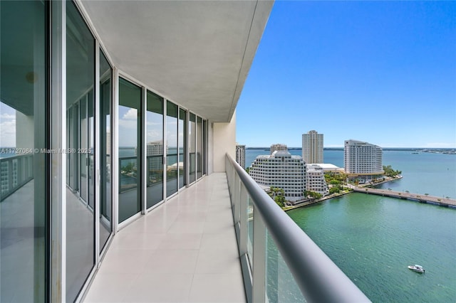 balcony featuring a water view