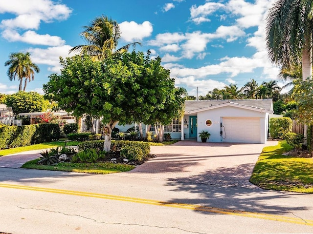 view of front of property featuring a garage