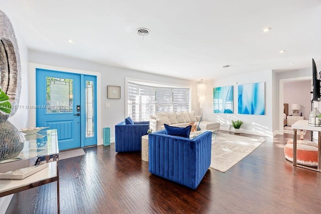 living room featuring dark hardwood / wood-style floors