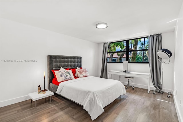 bedroom featuring hardwood / wood-style flooring