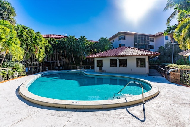 view of swimming pool featuring a gazebo and a patio area