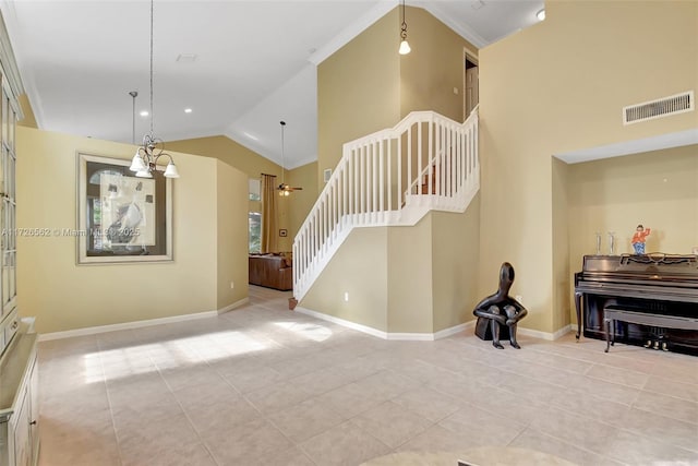 interior space featuring light tile patterned floors and high vaulted ceiling