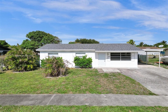 ranch-style house with a front yard