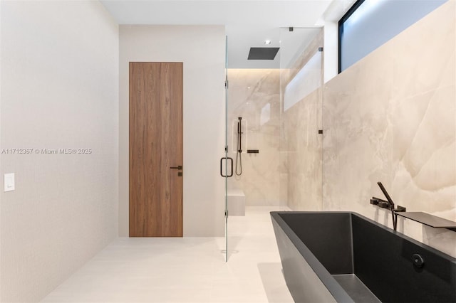 bathroom with an enclosed shower