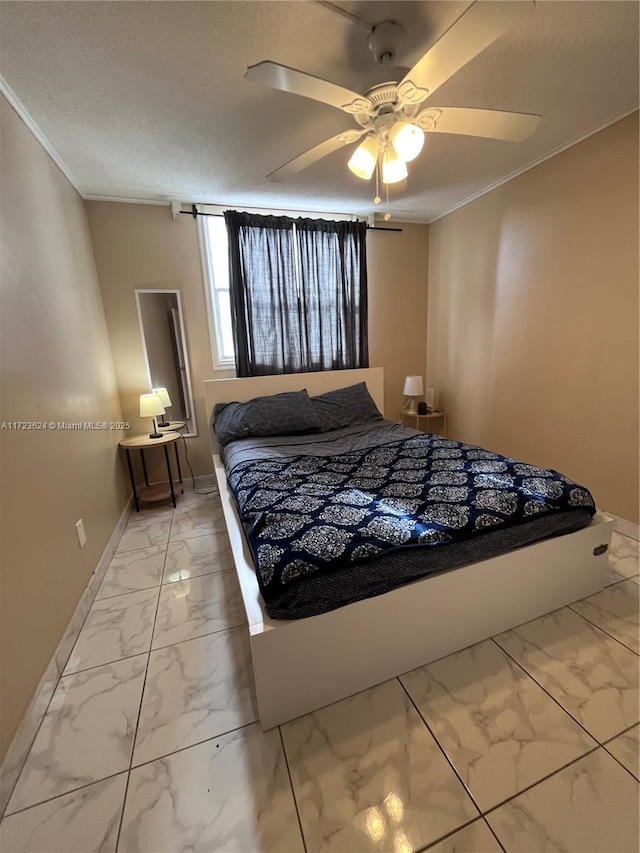 bedroom featuring ceiling fan, a textured ceiling, and crown molding