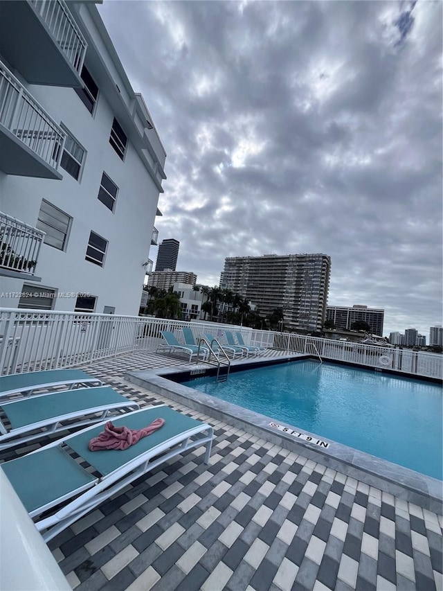 view of pool with a patio area