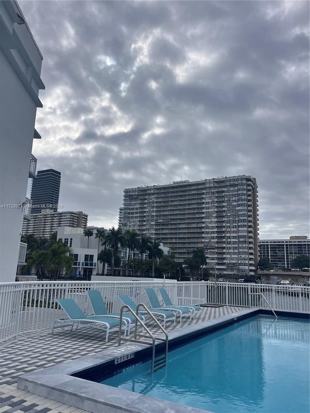 view of swimming pool featuring a patio