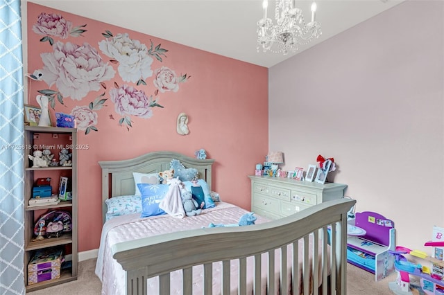 carpeted bedroom featuring an inviting chandelier