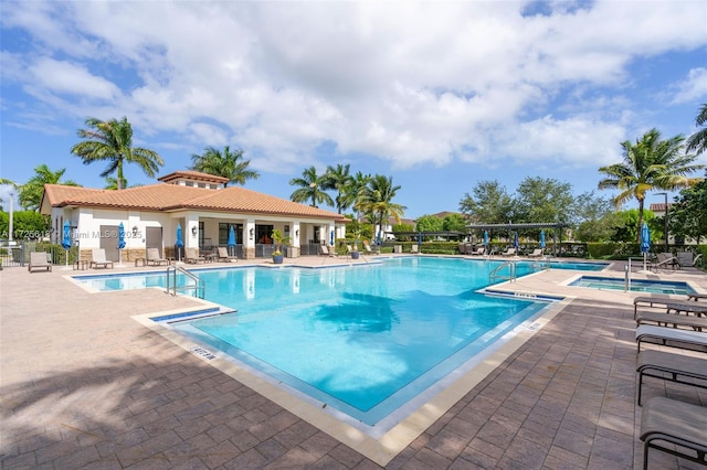 view of pool featuring a patio