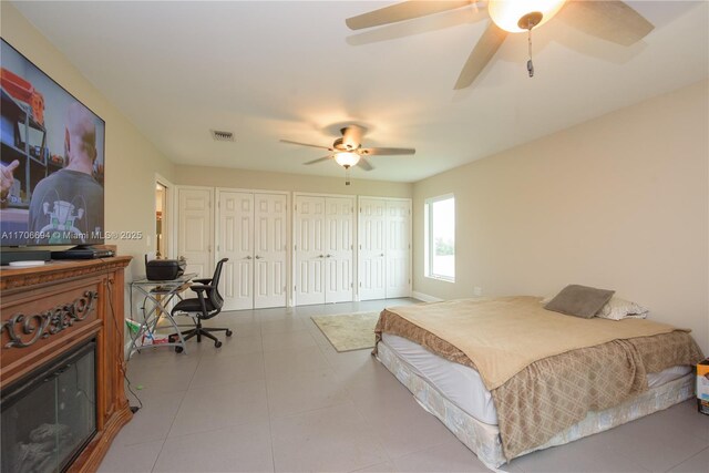 bathroom featuring tile walls, vanity, independent shower and bath, and tile patterned flooring