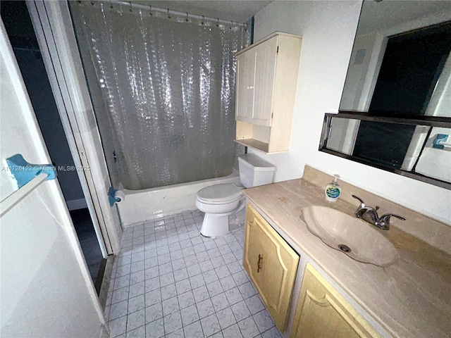 full bathroom featuring tile patterned floors, washtub / shower combination, vanity, and toilet