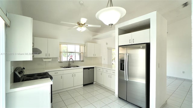 kitchen featuring white cabinetry, appliances with stainless steel finishes, backsplash, hanging light fixtures, and sink
