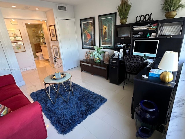 office area with tile patterned flooring