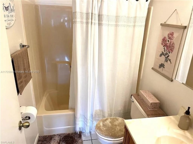 full bathroom with tile patterned flooring, toilet, vanity, and shower / bath combination with curtain