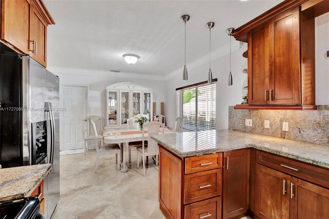 kitchen featuring stainless steel appliances, decorative backsplash, ornamental molding, and light stone counters