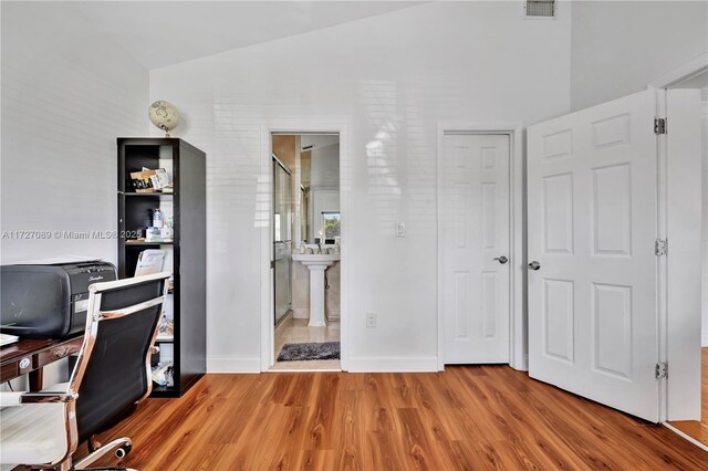 bedroom with ceiling fan, crown molding, and hardwood / wood-style flooring