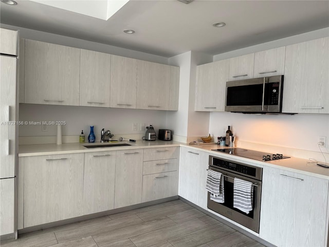 kitchen with sink and stainless steel appliances