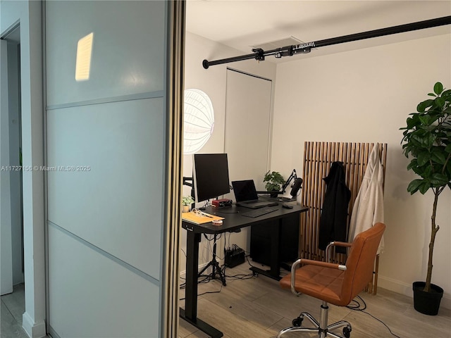 office space featuring light hardwood / wood-style floors