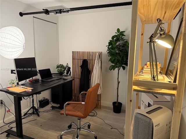 office featuring light hardwood / wood-style flooring